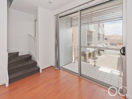 Open the Door to City Serenity with a Private Balcony - Photo 5