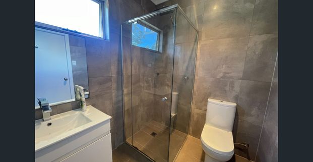 Spacious 4-Bedroom Home with Separate Retreat - Photo 1