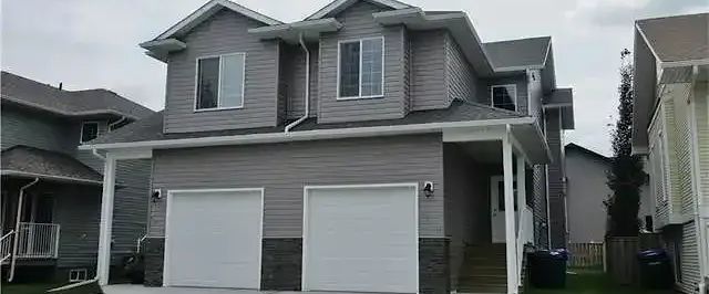 4 bedroom House in Olds | Olds - Photo 1