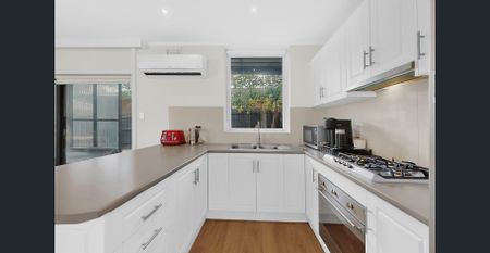 Updated Villa with Private Outdoor Space in a Quiet Low-Density Setting - Photo 2