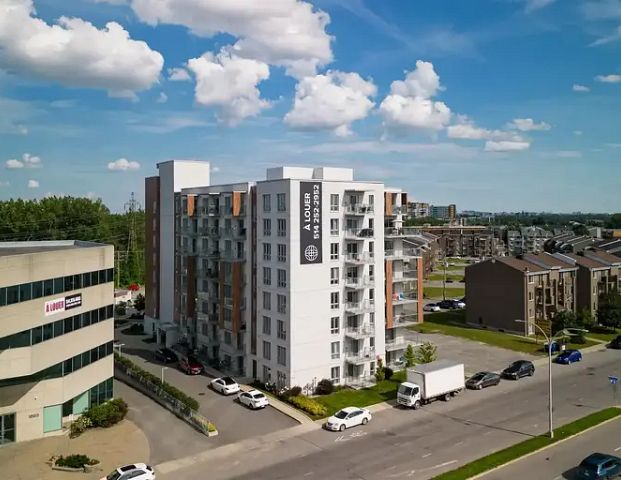 The Topaz Laval Apartments | 1555 boul. Laval, Laval - Photo 1