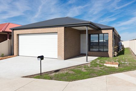NEAR NEW THREE BEDROOM HOME IN GREAT LOCATION - Photo 4