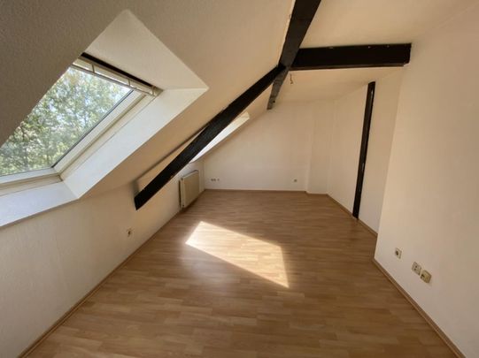 Kurzfristig bezugsfertig! Tolll geschnittene 3-Zimmer-Dachgeschosswohnung in Bocholt - Photo 1