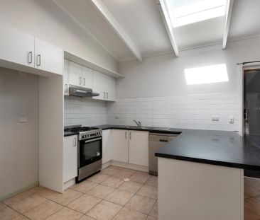 Beautifully Presented 4-Bedroom Home in a Quiet, Central Location - Photo 2