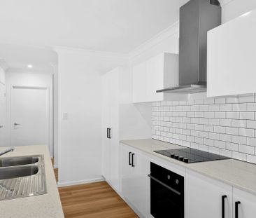 NEAR NEW - THREE BEDROOM, TWO BATHROOM! - Photo 4