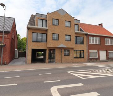 Een gelijkvloers appartement met 2 slaapkamers, tuin en garage. - Photo 3