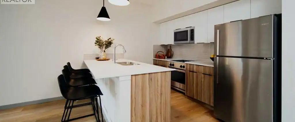 255 & 245 Carrington Plaza — 1 Bedroom - Photo 1