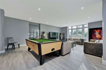 Refined family home with stunning interiors and landscaped garden situated in the exclusive St George's Hill Estate. Available for a SHORT LET of six to twelve months. - Photo 2