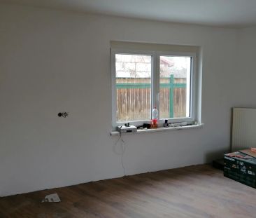 Gemütliche 3-Zimmer-Erdgeschosswohnung mit kleinem Grund - Foto 2