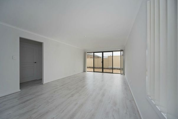 Modern 3-Bedroom Courtyard Home in a Coastal Lifestyle Location - Photo 1