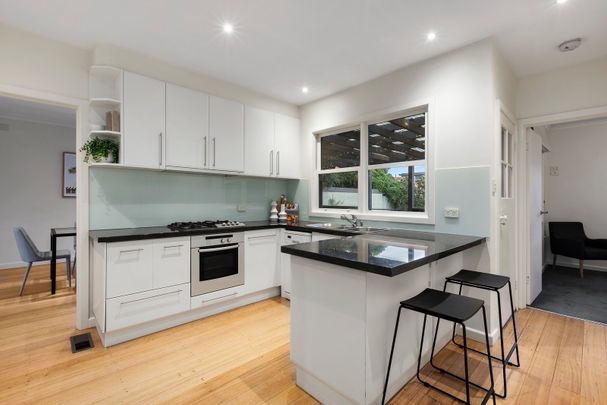 Neat & Tidy 3 Bedroom Home On a "Beach-Side of the Highway" Position! - Photo 1