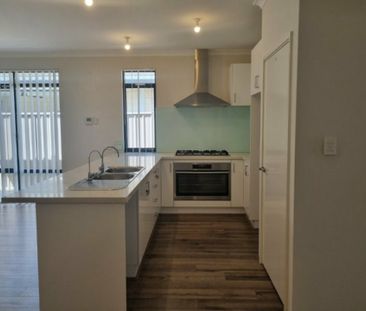 Spacious 4-Bedroom Home in a Convenient Location – Available Now - Photo 4