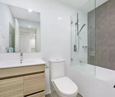 Modern Masterpiece – Split Level Two Bedroom Townhouse Style Apartm... - Photo 6