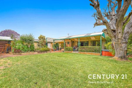 Charming 1950s Home with Modern Flexibility & Pristine Gardens! - Photo 5