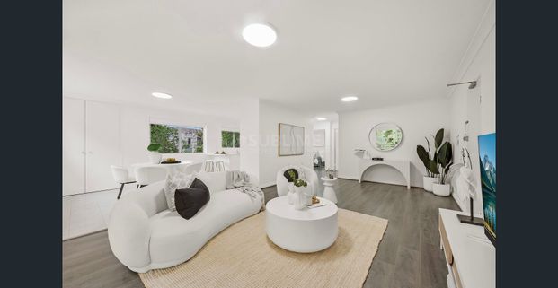 Wonderful Rear Facing Full Brick Apartment with Massive Storage Room! - Photo 1