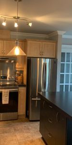 4 1/2 condo a louer Beauport - Photo 3