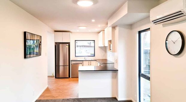 Fully Furnished City Townhouse with Secure Garage - Photo 1