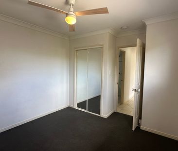 Relaxed Living with a Touch of Indulgence in the Heart of Runaway Bay - Photo 4