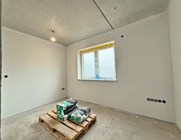 Erstbezug! Obergeschosswohnung in zentraler Lage von Augustfehn | Lift und Einbauküche - Foto 1