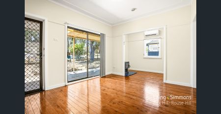 Charming Family Home with Spacious Backyard! - Photo 2