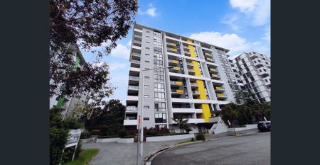 Conveniently Located Mid Level Modern Apartment with Pleasant Views & Complex Facilities - Photo 3