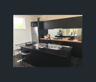 Stylish Two-Level Townhouse in a Quiet, Convenient Location - Photo 1