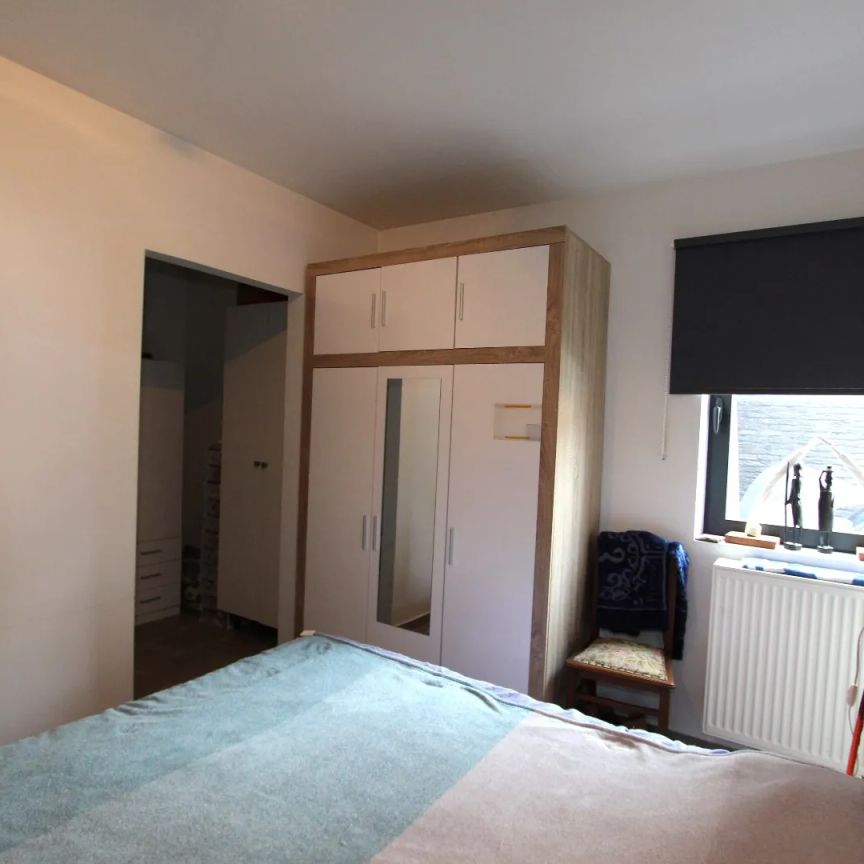 GELIJKVLOERS APPARTEMENT MET 2 TERRASSEN EN AUTOSTAANPLAATS - Photo 1