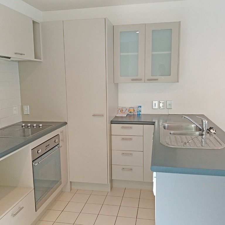 Townhouse Living in fully gated complex with 2 carparks - Photo 1
