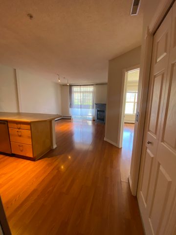 Cozy 2-Bedroom Condo with Underground Parking in Victoria Park - Photo 2