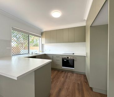 FRESHLY RENOVATED FAMILY HOME IN KIRWAN! - Photo 4