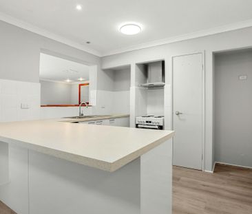 Freshly Renovated & Full of Space - Available Now - Photo 3