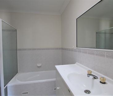 Two Bedroom Unit in Great Location - Photo 1