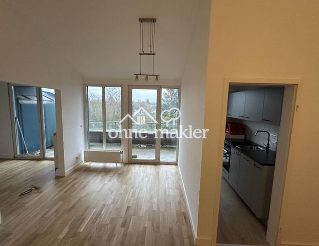 Helle Dachgeschosswohnung mit neuer EBK & neuem Bad - Foto 1