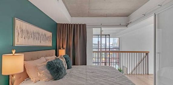 FULLY STOCKED AND FURNISHED LOFT IN THE HEART OF LIBERTY VILLAGE! - Photo 2