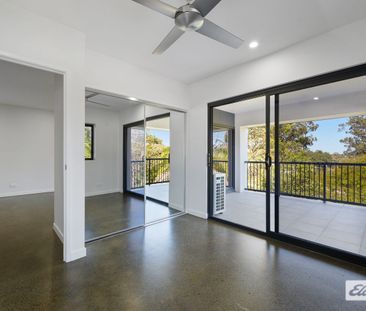 Elevated Apartment Living with Two Car Convenience - Photo 4