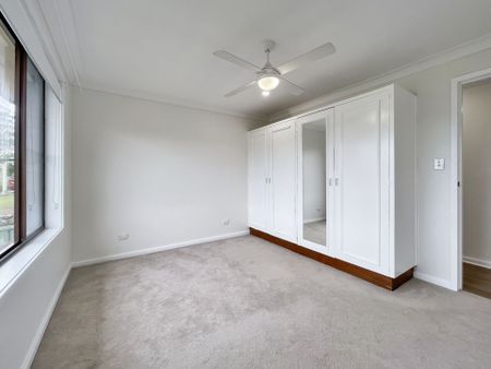 Renovated 3-Bedroom Home with Double Garage & Multiple Living Areas - Photo 5