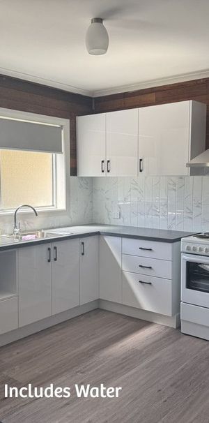 Convenient and low maintenance - Rent price includes water - Photo 1