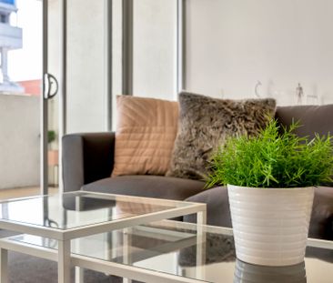 Furnished CBD Apartment with Large Balcony - Photo 1