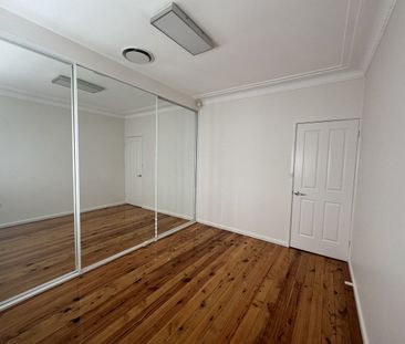 FULLY RENOVATED 3 BEDROOM FAMILY HOME IN GREAT LOCATION - Photo 4