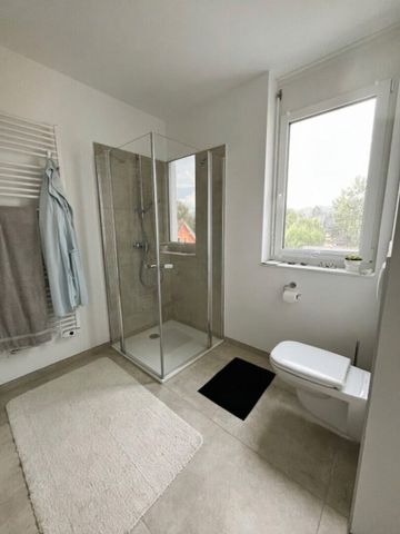 Moderne 3-Zimmer-Wohnung mit großzügigem Balkon und nachhaltigem Energiekonzept - Photo 4