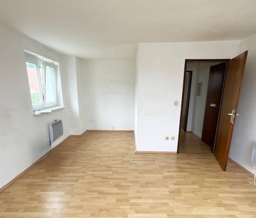 Gemütliche Dachgeschosswohnung mit Küche - Foto 3