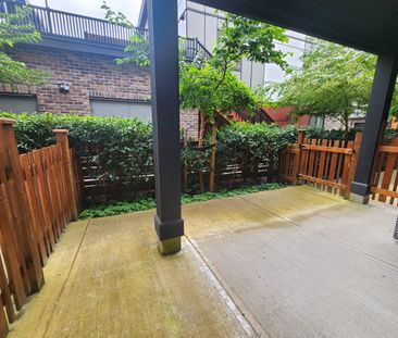 Stunning Three Bedroom Townhouse with Huge Roof Top Patio, Yard and... - Photo 2