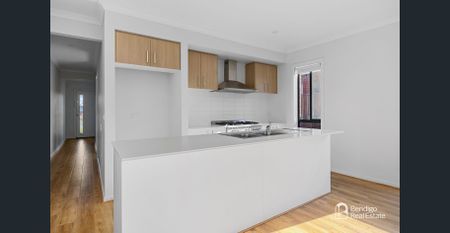 SPACIOUS FOUR-BEDROOM FAMILY HOME WITH YEAR-ROUND COMFORT - Photo 4