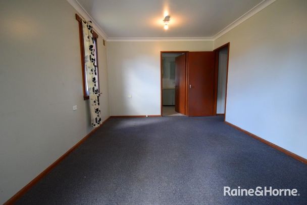 Affordable Three Bedroom - Photo 1