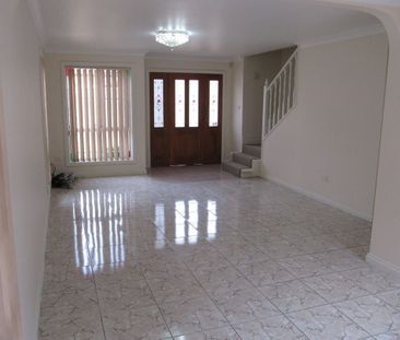 Three Bedroom Well Maintained Townhouse - Photo 2