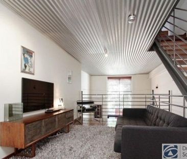 Stunning tri-level townhouse in historic warehouse conversion - Photo 1