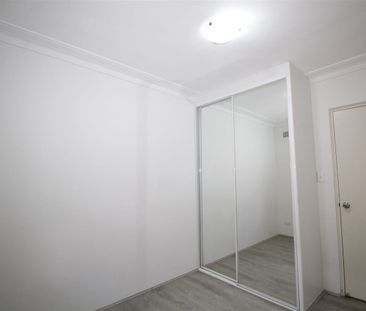 BRIGHT AND SUNNY TOP FLOOR UNIT - Photo 5