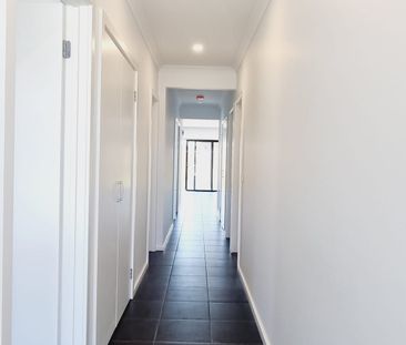 Home with Modern Comforts and Secure Garage - Photo 5