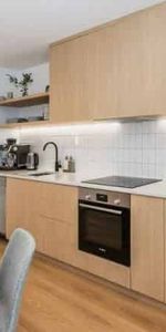 Modern & Sun-Soaked Two-Bedroom Townhouse - Photo 4