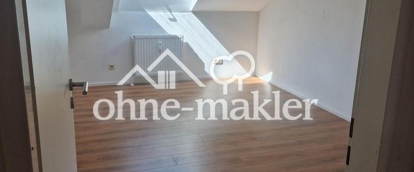 Helle Dachgeschosswohnung mit Charme - Foto 1